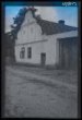 Dům čp. 11 "u Nováků" - přízemní zděný, se štítem s plochými lisénami a římsou a s ozdobnými okénky