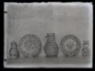 Slovenská keramika ze sbírek národopis. odd.: džbán s řemeslnickými atributy, džbán s náboženským motivem (P. Maria), talíře s květinovým dekorem