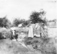 Vesnické ženy perou prádlo u potoka