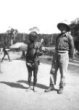 B.Machulka s mužem kmene Bambuti, který drží luk a šípy