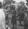 Žena kupující na trhu kukuřice, Kikujové