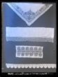Nahoře šátek karmazínový hedv. vyšitý č. v. 112; výšivka z úvodnice č. v. 502, výšivka z rukávců od Pezinku č. v. 201, slovenská krajka č. v. 323